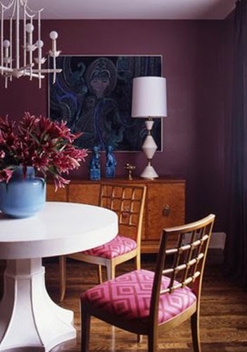 Amazing dining room with lime green walls paint color, glossy black painted  crown molding, blue buffet, avian art gallery, mirrored tiles disco ball  pendant