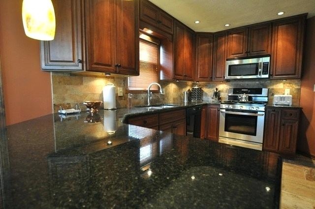 granite countertops with tile backsplash