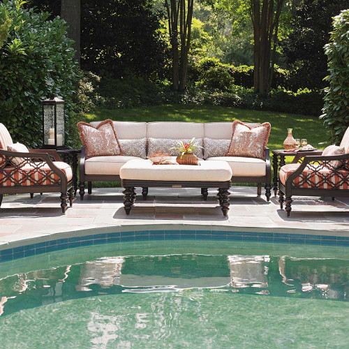 Patio outside of the sunroom: source: Southern Living Covered porch with  black shutters, lime green garden stool, wicker chairs, powder blue velvet  pillows