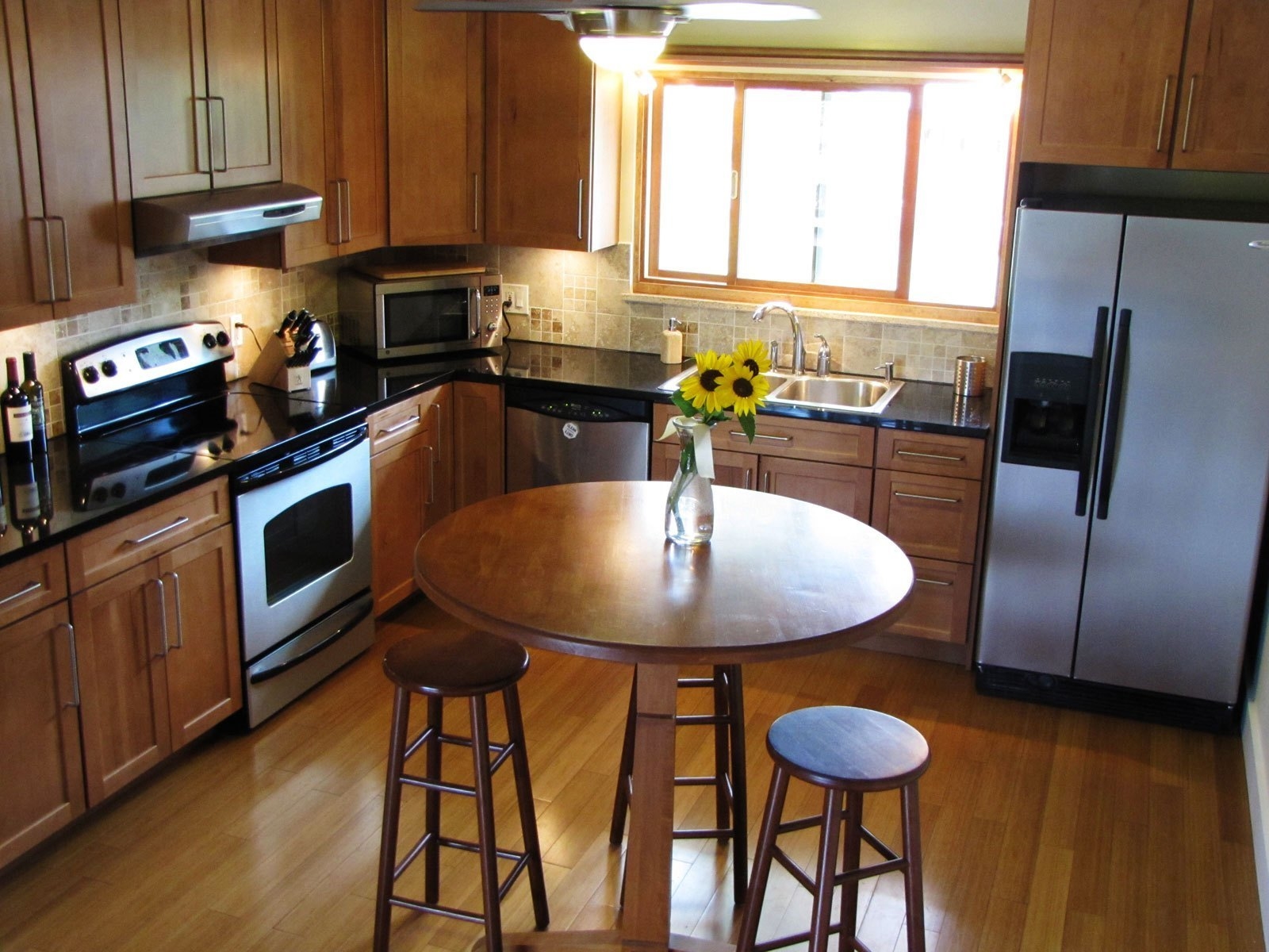 Big ugly wall, old cabinets, and a very closed in feeling