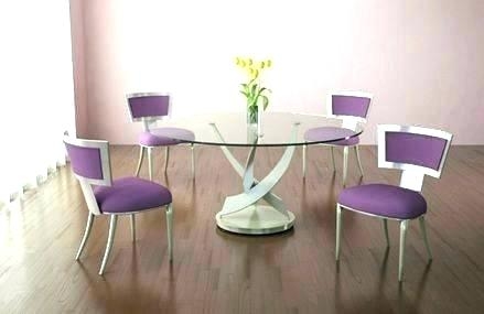 Interior of light dining room decorated with lilac flowers