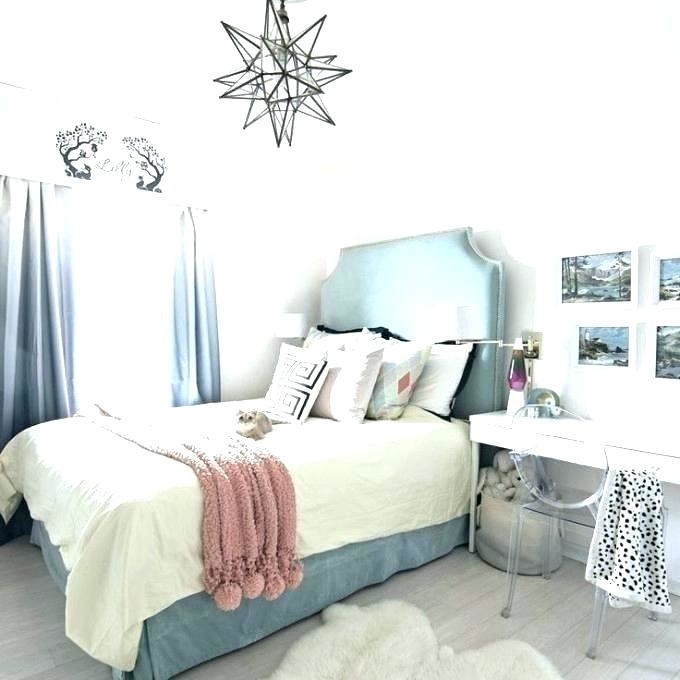 boho style room, with a woven, pale beige swing, and a bed in Teenage Girl  Room Ideas