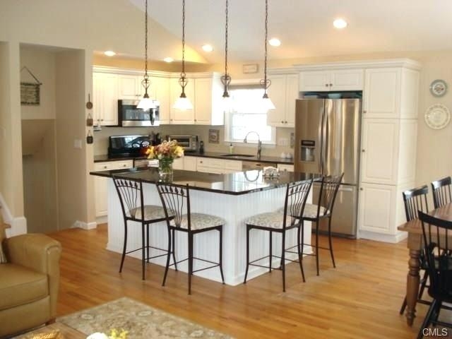 Beautiful farmhouse style kitchen all done  by Joanna Gaines