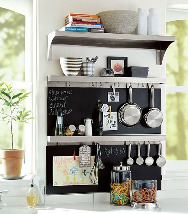 A small shelf that displays knickknacks elsewhere in the house can also  work in the kitchen to display dishware, providing a handy arrangement for  items